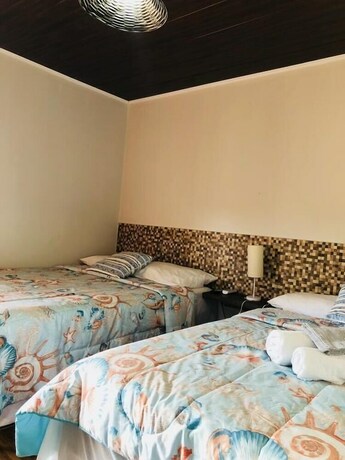 Imagen de la habitación del Hotel Pousada Beach House Coqueirinho. Foto 22