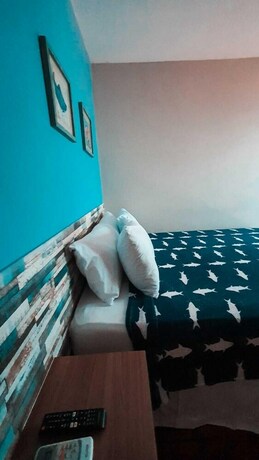 Imagen de la habitación del Hotel Pousada Beach House Coqueirinho. Foto 24