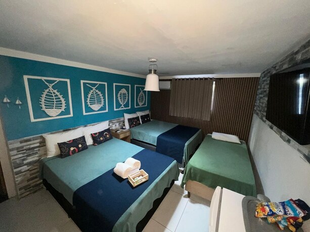 Imagen de la habitación del Hotel Pousada Beach House Coqueirinho. Foto 28