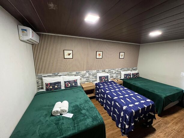 Imagen de la habitación del Hotel Pousada Beach House Coqueirinho. Foto 29