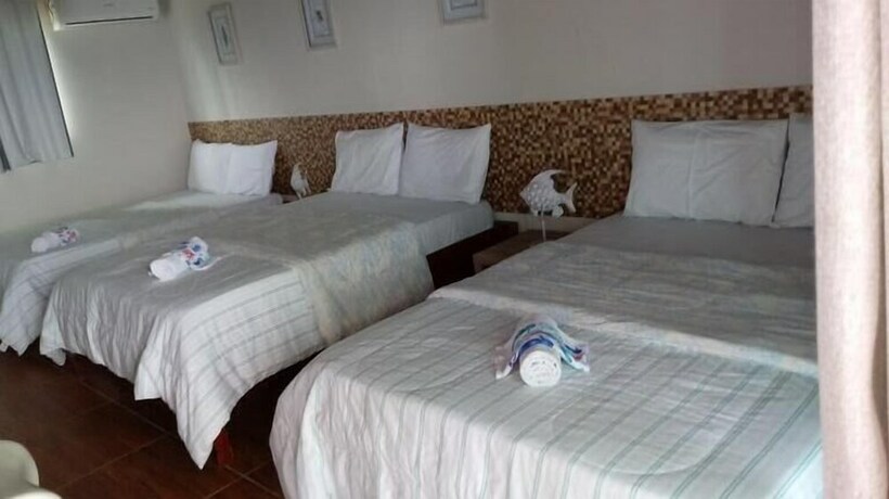 Imagen de la habitación del Hotel Pousada Beach House Coqueirinho. Foto 30