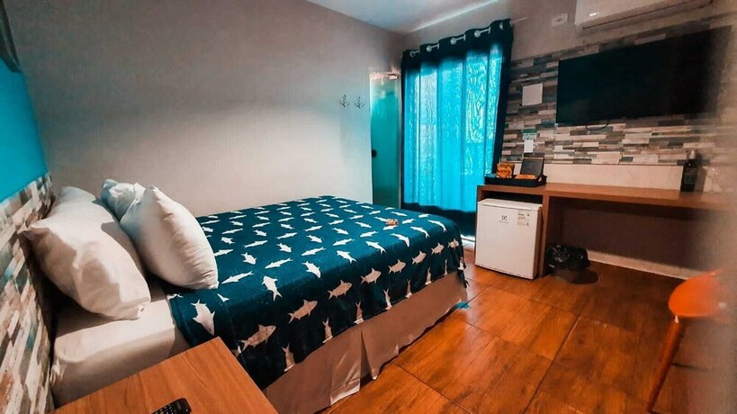 Imagen de la habitación del Hotel Pousada Beach House Coqueirinho. Foto 31