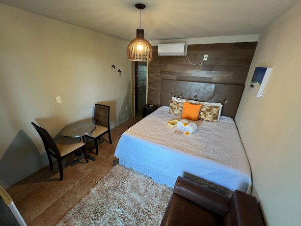 Imagen de la habitación del Hotel Pousada Beach House Coqueirinho. Foto 32