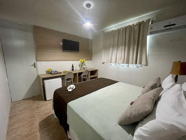 Imagen de la habitación del Hotel Pousada Beach House Coqueirinho. Foto 33