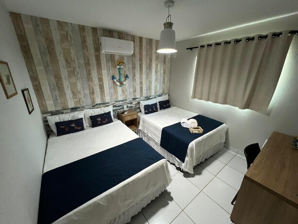 Imagen de la habitación del Hotel Pousada Beach House Coqueirinho. Foto 34