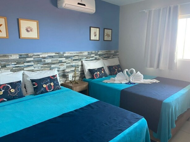 Imagen de la habitación del Hotel Pousada Beach House Coqueirinho. Foto 35