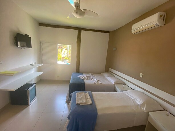Imagen de la habitación del Hotel Pousada BeachCamp Maresias. Foto 16