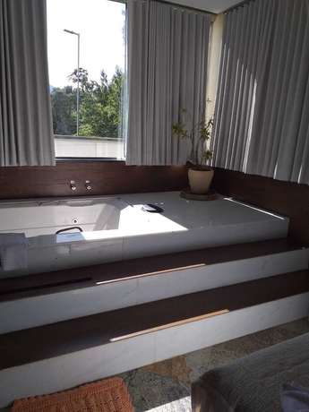 Imagen de la habitación del Hotel Pousada Beija-Flor, Po&ccedil;os de Caldas. Foto 10