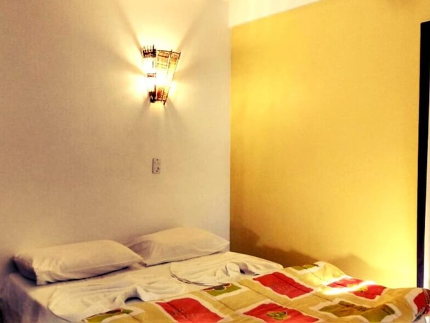 Imagen de la habitación del Hotel Pousada Beira Mar, Garopaba. Foto 13