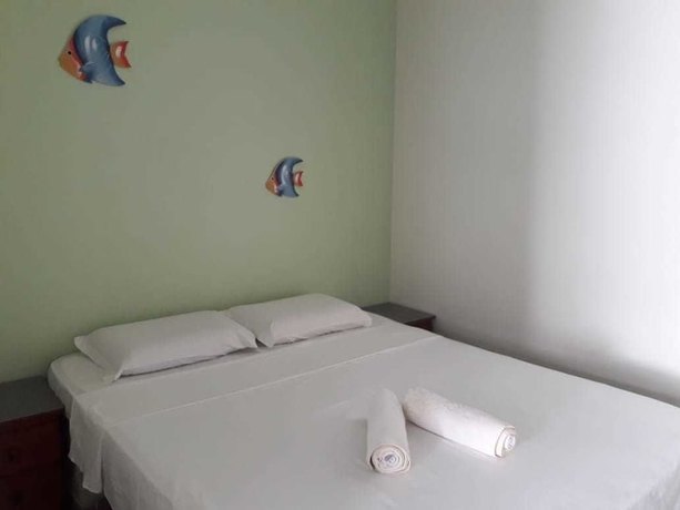 Imagen de la habitación del Hotel Pousada Bella Mar, Bertioga. Foto 8