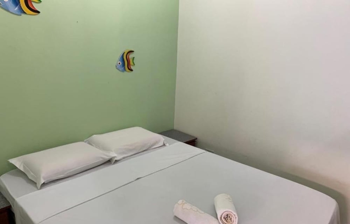 Imagen de la habitación del Hotel Pousada Bella Mar, Bertioga. Foto 9