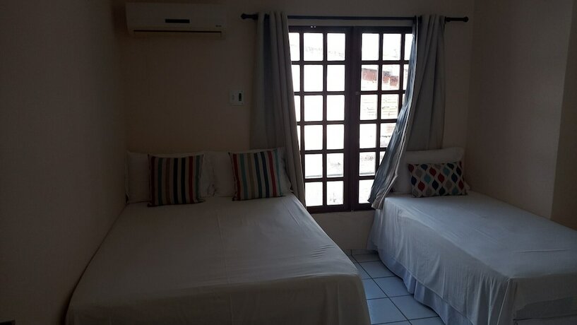 Imagen de la habitación del Hotel Pousada Brisa do Morro Ponta Negra. Foto 12