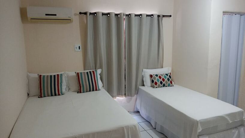 Imagen de la habitación del Hotel Pousada Brisa do Morro Ponta Negra. Foto 16