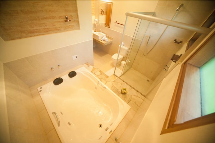 Imagen de la habitación del Hotel Pousada Bucaneve. Foto 9