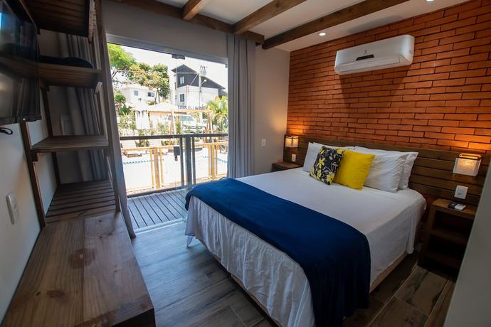 Imagen de la habitación del Hotel Pousada Cacau Praia do Rosa. Foto 2