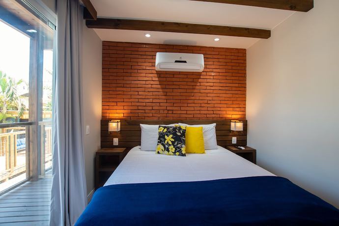 Imagen de la habitación del Hotel Pousada Cacau Praia do Rosa. Foto 5