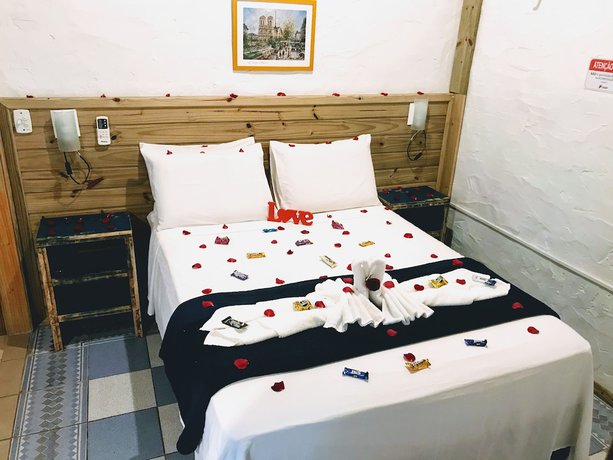 Imagen de la habitación del Hotel Pousada Cacau Praia do Rosa. Foto 7