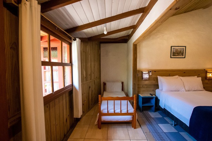 Imagen de la habitación del Hotel Pousada Cacau Praia do Rosa. Foto 8