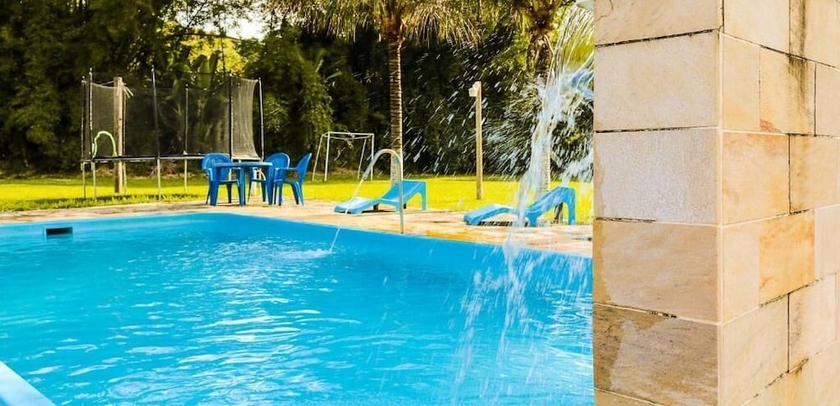 Imagen de la piscina del Hotel Pousada Cachoeira De Pentagna. Foto 19