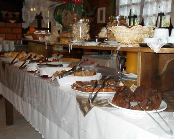 Imagen del bar/restaurante del Hotel Pousada Caliandra Da Serra. Foto 3
