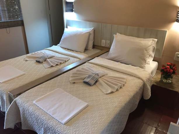 Imagen de la habitación del Hotel Pousada Caminho da Praia, Guarapari. Foto 6