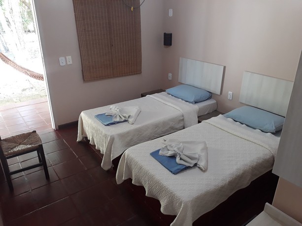Imagen de la habitación del Hotel Pousada Caminho da Praia, Guarapari. Foto 13