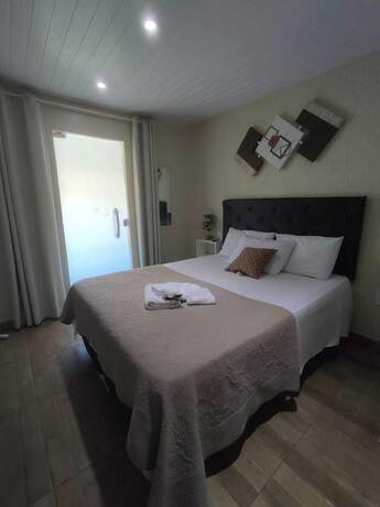 Imagen de la habitación del Hotel Pousada Caminho do Pontal. Foto 12