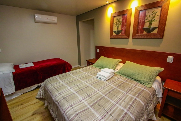 Imagen de la habitación del Hotel Pousada Caminho dos Pl&aacute;tanos. Foto 6
