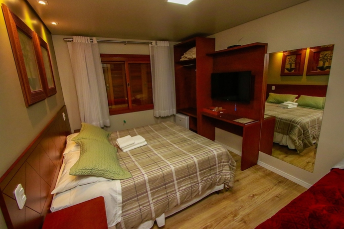 Imagen de la habitación del Hotel Pousada Caminho dos Pl&aacute;tanos. Foto 7