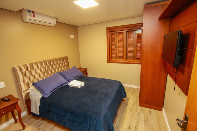 Imagen de la habitación del Hotel Pousada Caminho dos Pl&aacute;tanos. Foto 14