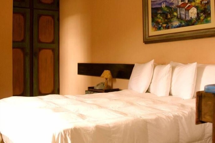 Imagen de la habitación del Hotel Pousada Candonga Da Serra. Foto 3