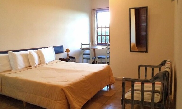 Imagen de la habitación del Hotel Pousada Candonga Da Serra. Foto 18