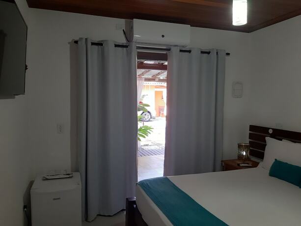 Imagen de la habitación del Hotel Pousada Canoa Cai&ccedil;ara. Foto 13
