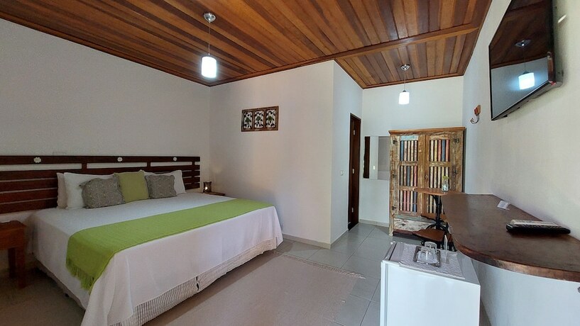 Imagen de la habitación del Hotel Pousada Canoa Cai&ccedil;ara. Foto 18