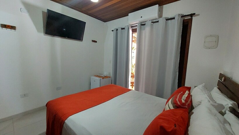 Imagen de la habitación del Hotel Pousada Canoa Cai&ccedil;ara. Foto 19