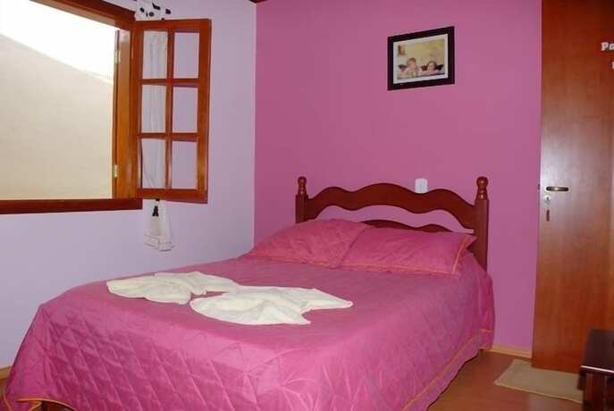 Imagen de la habitación del Hotel Pousada Cantinho dos Anjos. Foto 17