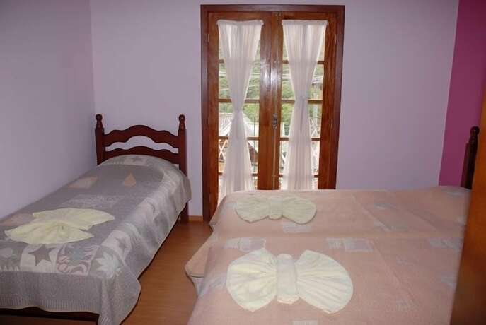 Imagen de la habitación del Hotel Pousada Cantinho dos Anjos. Foto 18