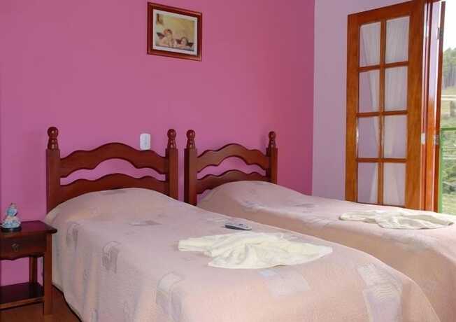 Imagen de la habitación del Hotel Pousada Cantinho dos Anjos. Foto 19
