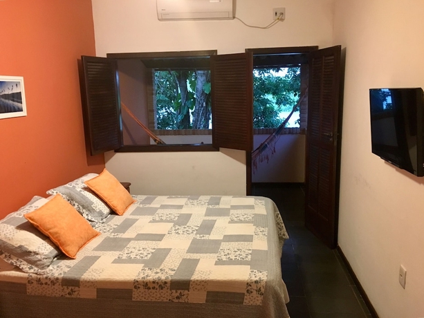 Imagen de la habitación del Hotel Pousada Canto Do Rio. Foto 8