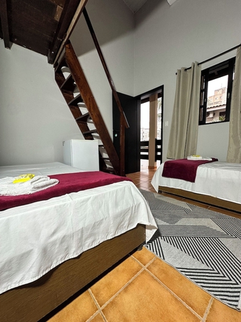 Imagen de la habitación del Hotel Pousada Canto da Montanha Guaruj&aacute;. Foto 9