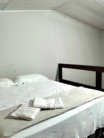 Imagen de la habitación del Hotel Pousada Canto da Montanha Guaruj&aacute;. Foto 13