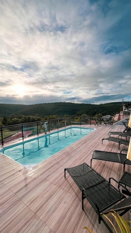 Imagen de la piscina del Hotel Pousada Canto do Cedro. Foto 14
