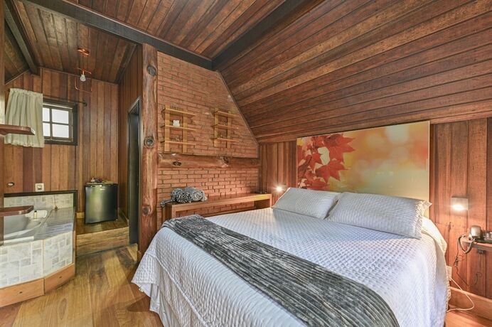 Imagen de la habitación del Hotel Pousada Cantos e Contos, Camanducaia. Foto 18