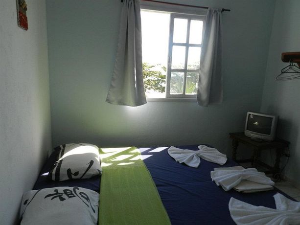 Imagen de la habitación del Hotel Pousada Caravelas. Foto 12