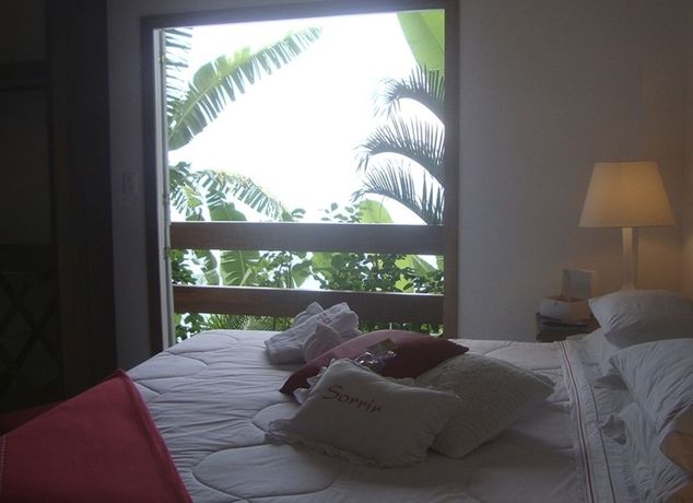 Imagen de la habitación del Hotel Pousada Casa Do Bicho Pregui&ccedil;a. Foto 8