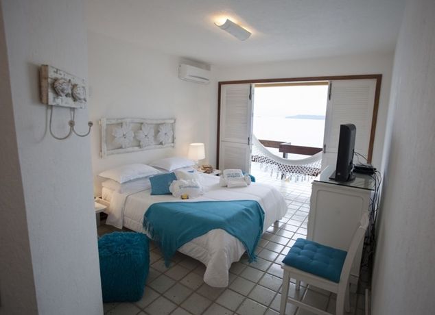 Imagen de la habitación del Hotel Pousada Casa Do Bicho Pregui&ccedil;a. Foto 10