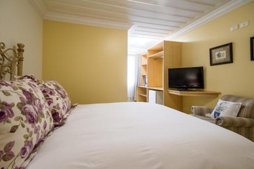 Imagen de la habitación del Hotel Pousada Casa Gialla. Foto 6