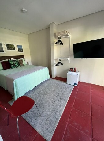 Imagen de la habitación del Hotel Pousada Casa Paradiso. Foto 16
