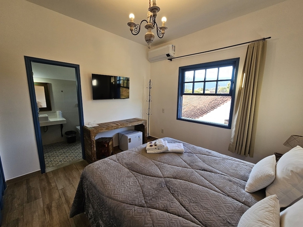 Imagen de la habitación del Hotel Pousada Casa da Tuta. Foto 10