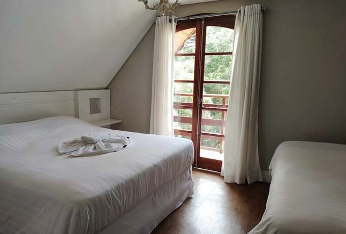 Imagen de la habitación del Hotel Pousada Ch&acirc;teau dos Fontes, Campos do Jordao. Foto 18
